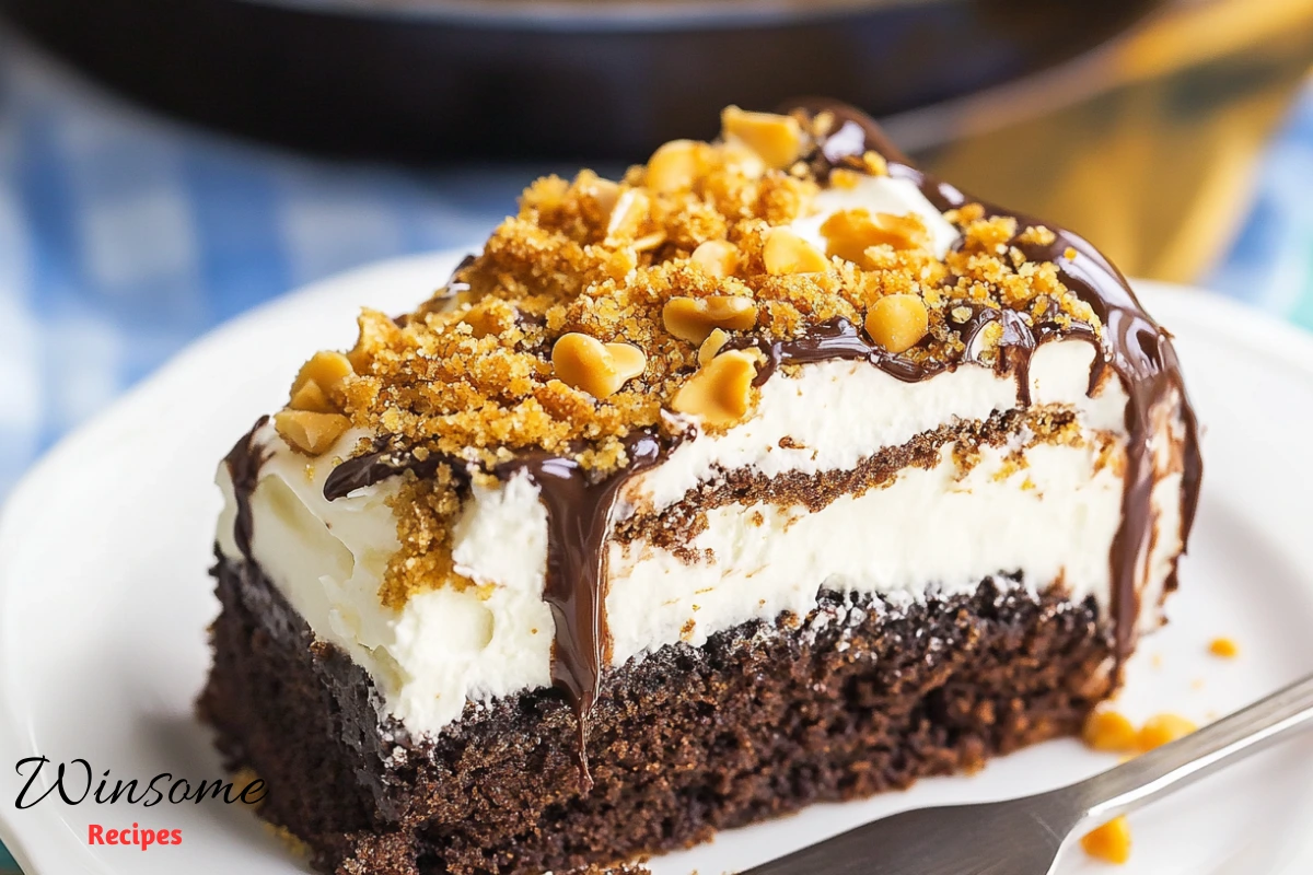 butterfinger cake recipe in a white plate - winsome recipes
