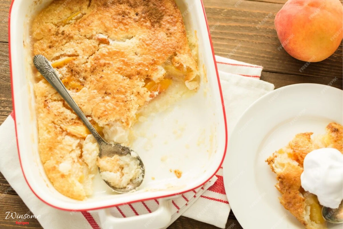 peach cobbler with cake mix served in a white plate