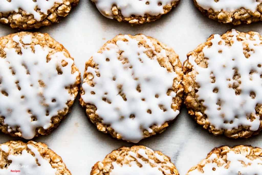Delicious Iced Oatmeal Cookies drizzled with a sweet glaze, perfect for a tasty treat!