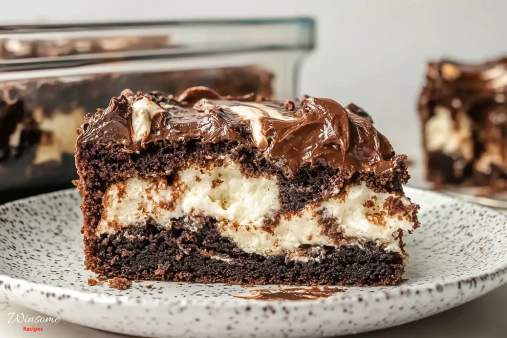 A rich, moist earthquake cake with cracks revealing creamy layers of coconut and swirls of melted chocolate.