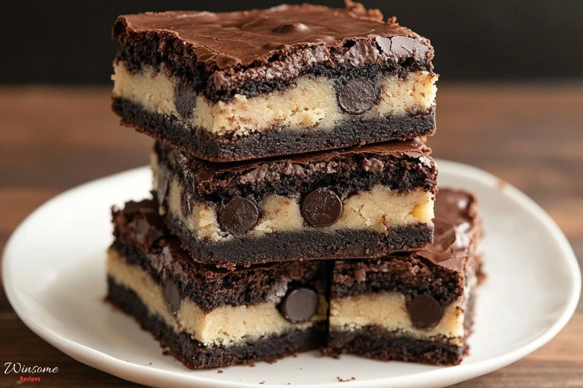 A stack of three decadent brownie bars on a white plate, showcasing a rich and indulgent dessert experience.