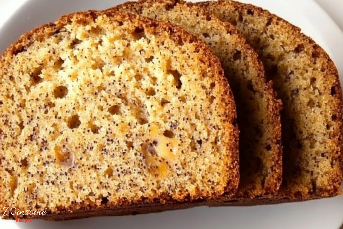 Slices of banana bread made with two bananas, arranged neatly on a white plate.