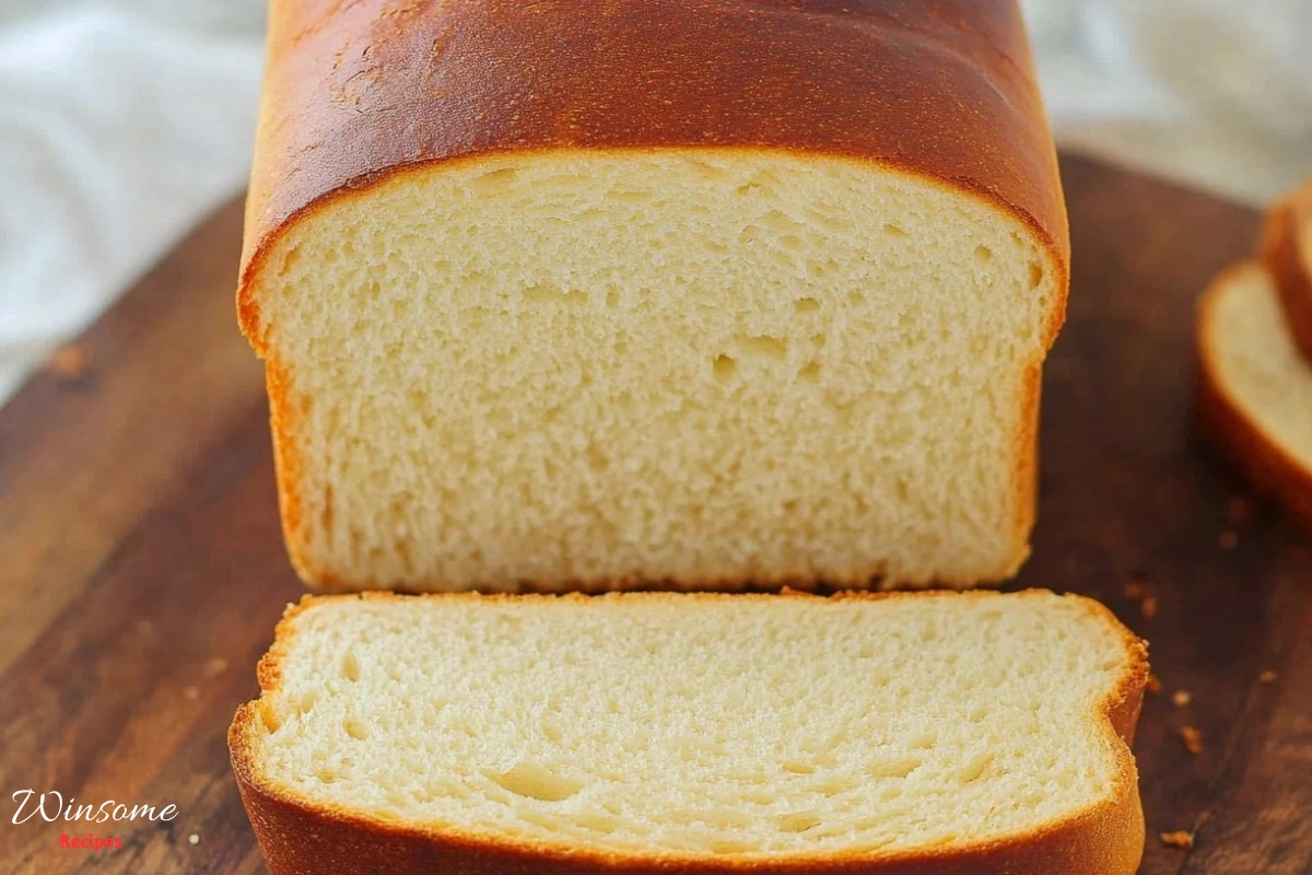 A loaf of Wonder Bread sliced into even pieces, showcasing its soft texture and classic white color.